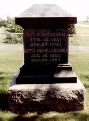 Holden West Cemetery - with the nameside of the Jacobsen marker  --  med Niels og Netta Jacobsens gravstein, navnesiden.